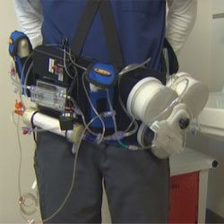 Picture of a person wearing an artificial kidney setup
